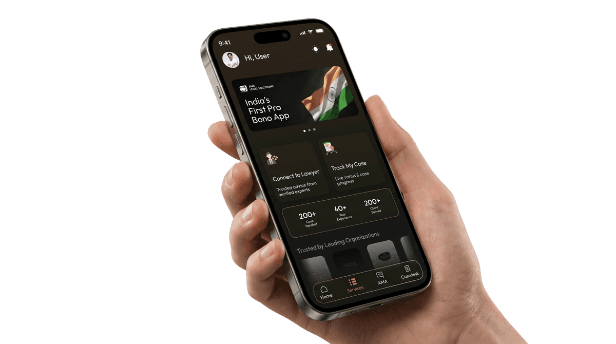 Hand holding a smartphone showing the AMA Connect app